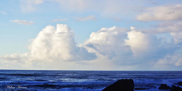 Fluffy low lying clouds over the Pacific