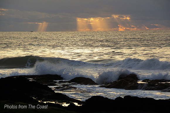 Sunset through The Storm Clouds