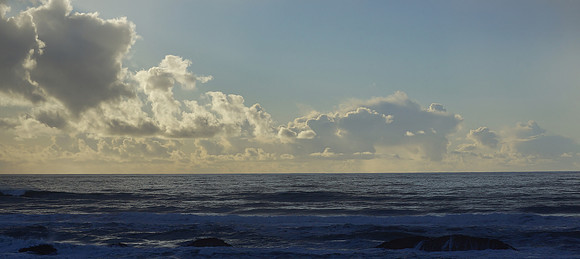 Light in the Clouds over the Dark Pacific